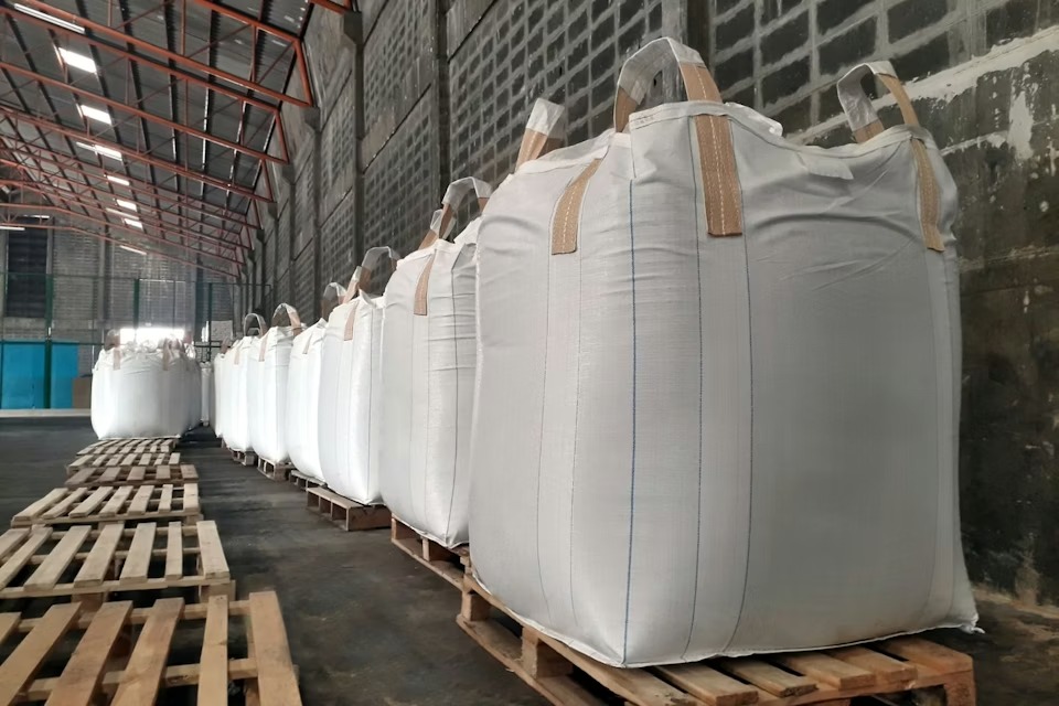 Bulk bags of granular sulphur in a warehouse